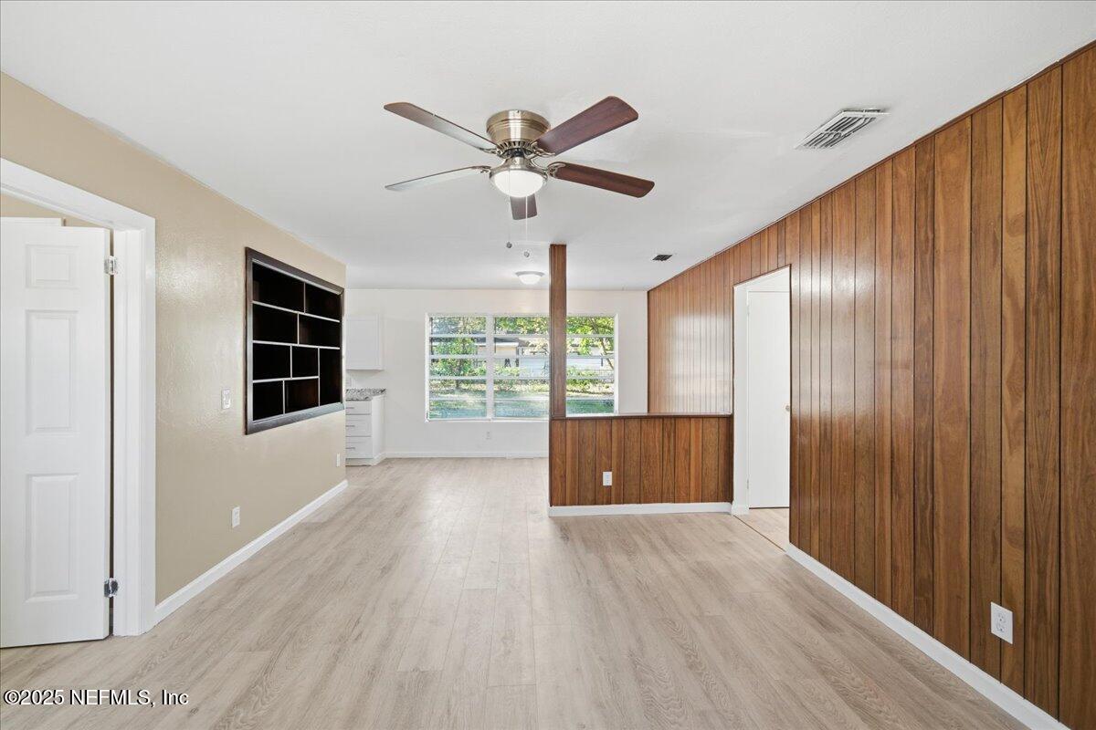 2142 Fouraker Road Jacksonville, FL 32210 - Photo 10 of 29 a view of workspace with furniture and window