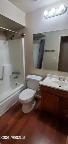 a bathroom with a sink a toilet and a bathtub