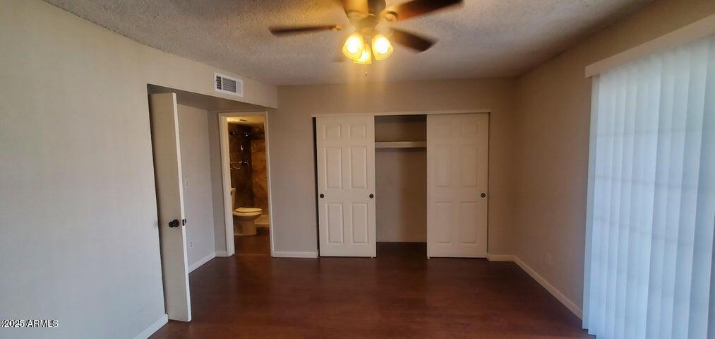 824 West Fordham Drive Tempe, AZ 85283 - Photo 13 of 20 wooden floor in an empty room with a window