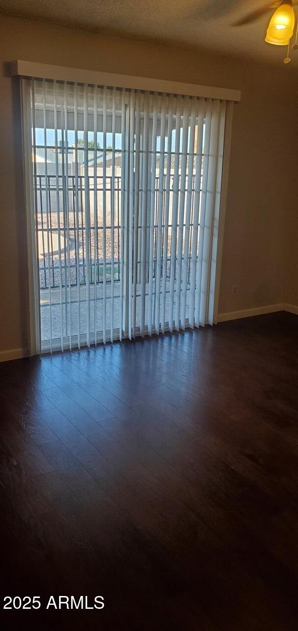 824 West Fordham Drive Tempe, AZ 85283 - Photo 20 of 20 a view of wooden floor and windows in a room