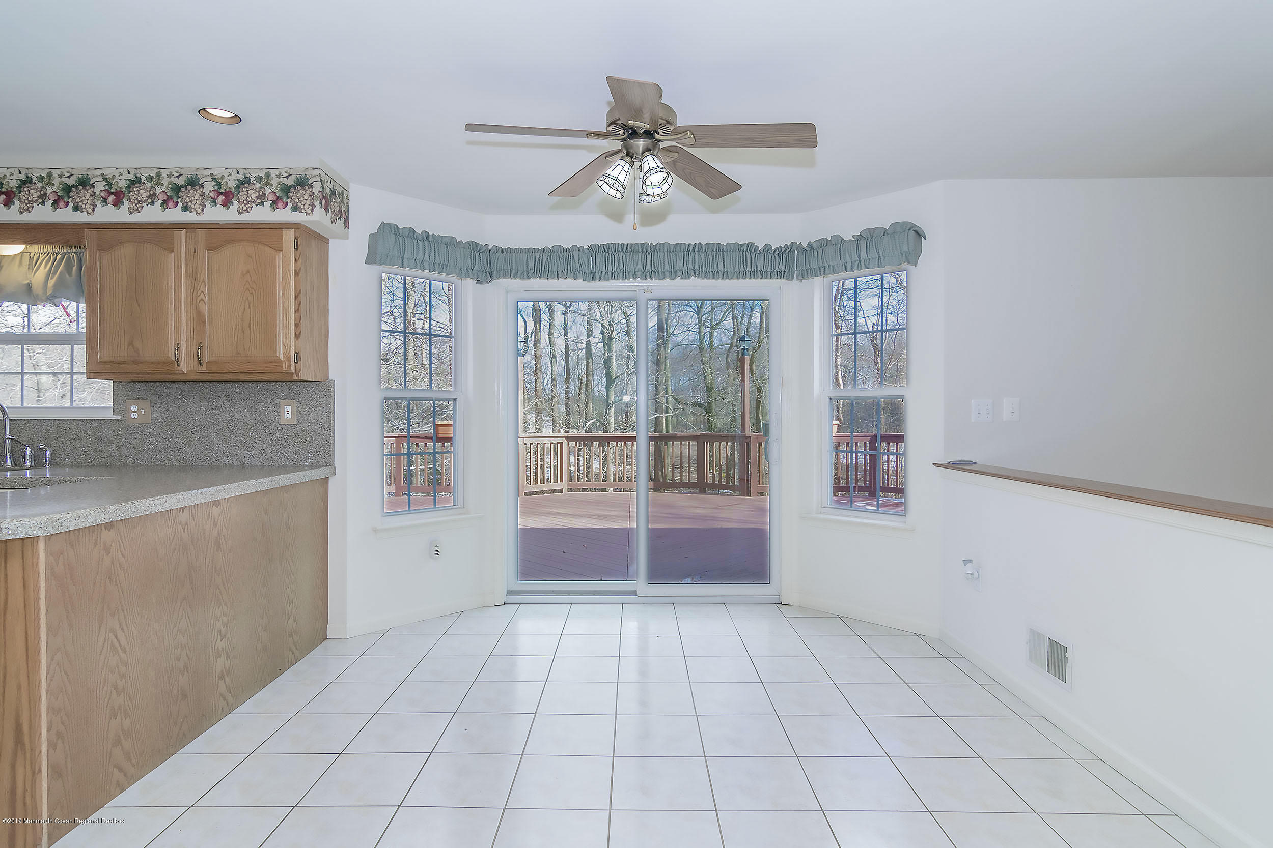 403 Meadowood Road Jackson, NJ 08527 - Photo 16 of 46 a view of an empty room with a window