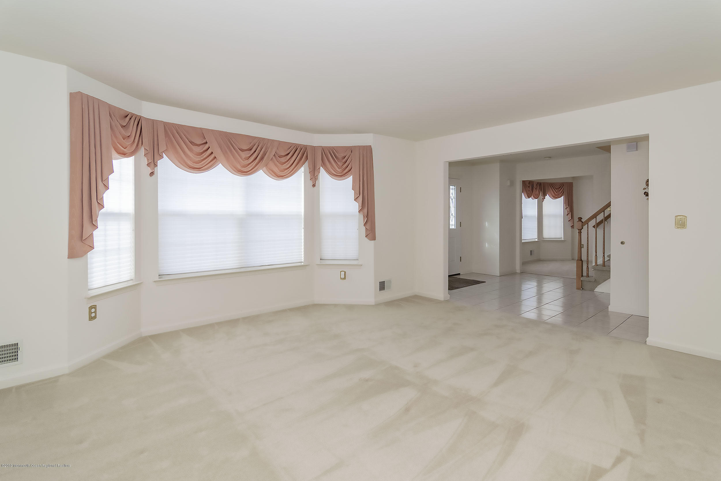 403 Meadowood Road Jackson, NJ 08527 - Photo 17 of 46 a view of an empty room with a window