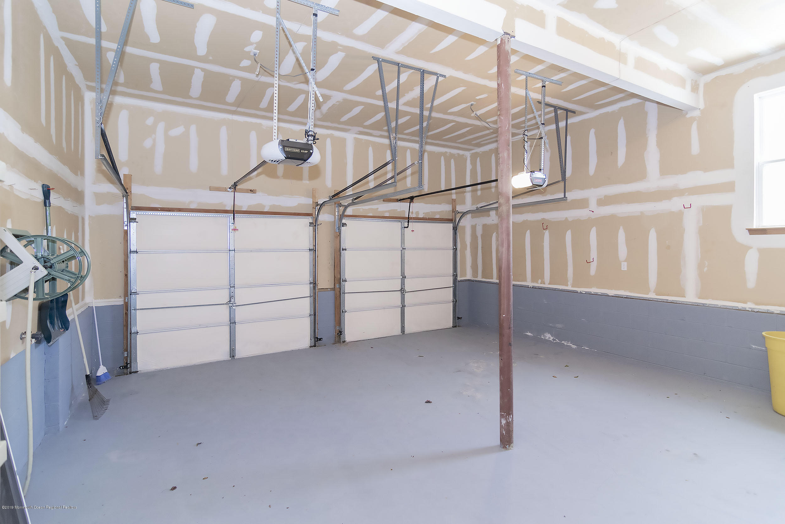 403 Meadowood Road Jackson, NJ 08527 - Photo 39 of 46 a view of a room with racks on the wall
