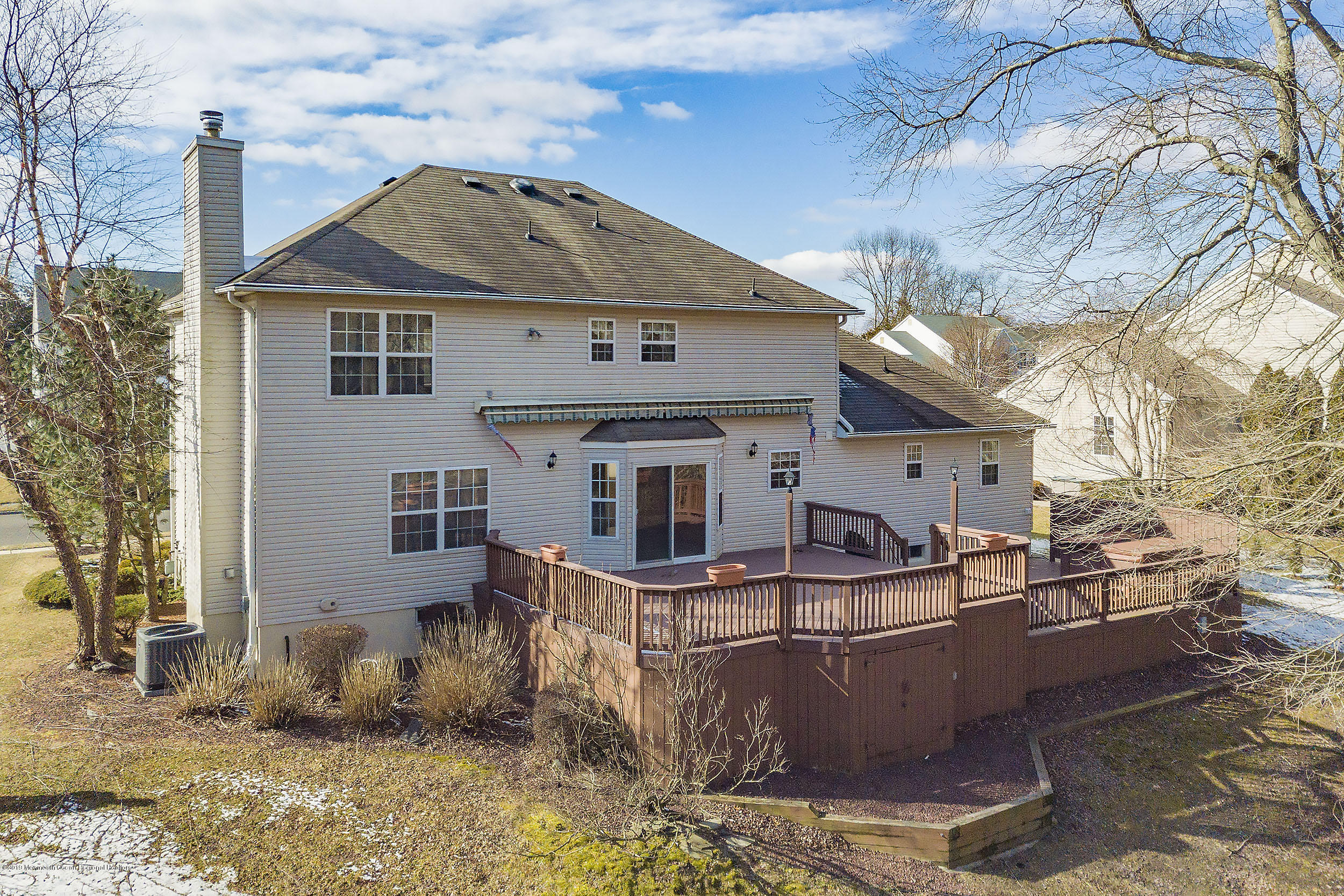 403 Meadowood Road Jackson, NJ 08527 - Photo 40 of 46 a front view of a house with sitting area