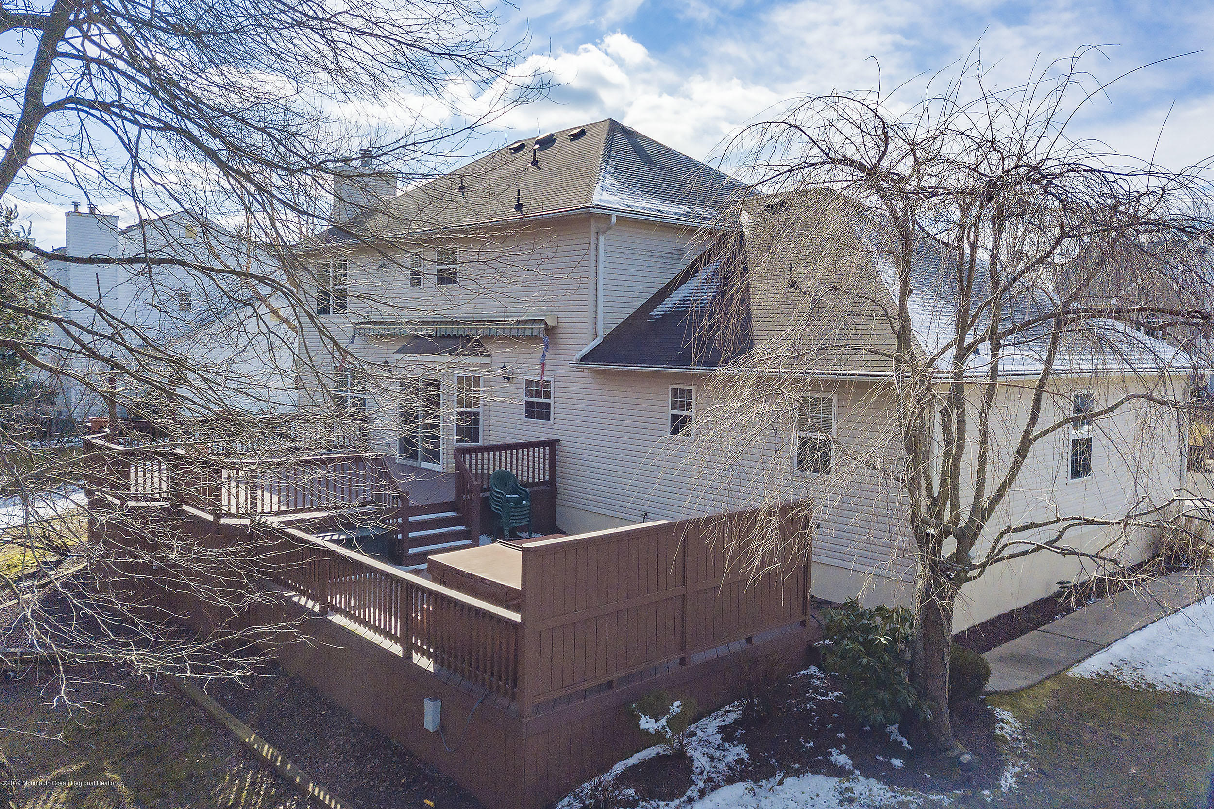 403 Meadowood Road Jackson, NJ 08527 - Photo 41 of 46 a view of a building with a large tree