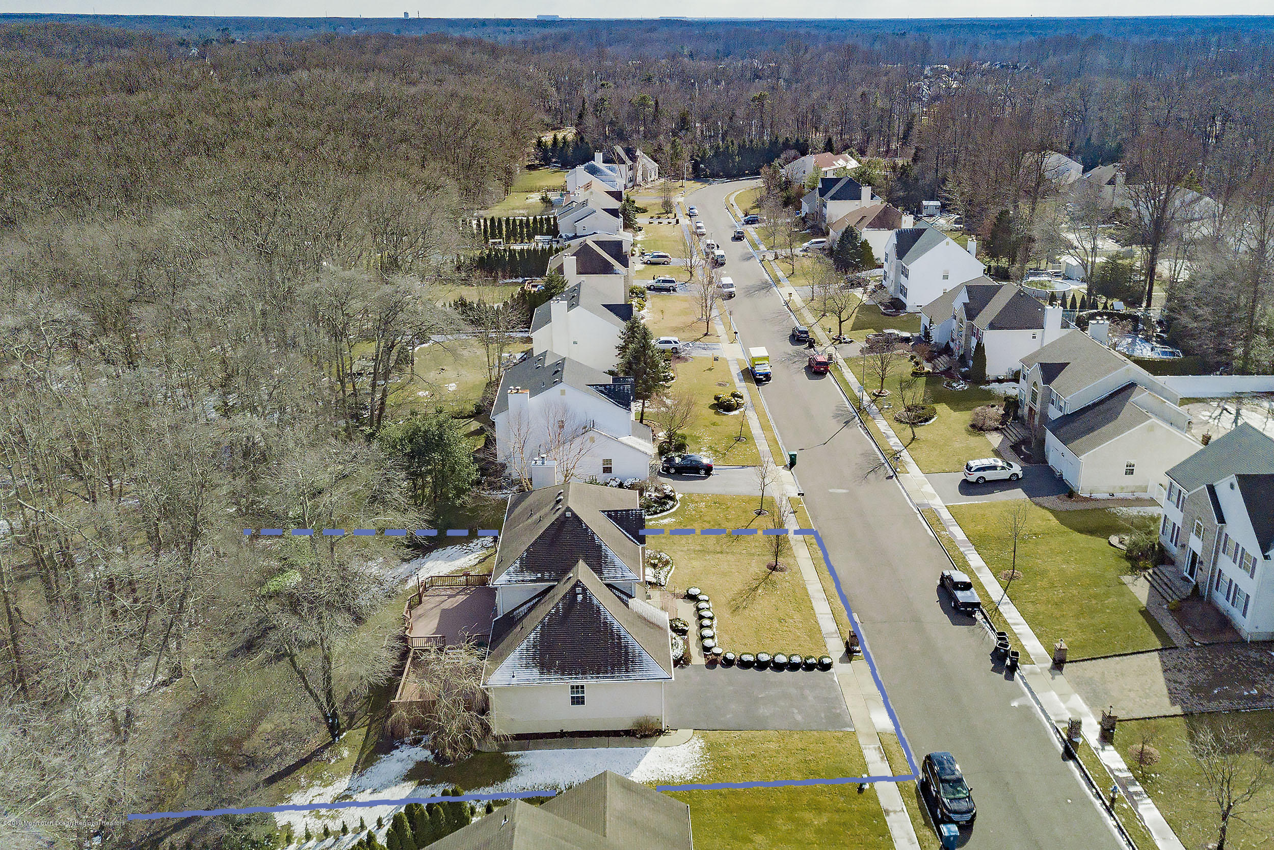 403 Meadowood Road Jackson, NJ 08527 - Photo 44 of 46 an aerial view of a house with a yard