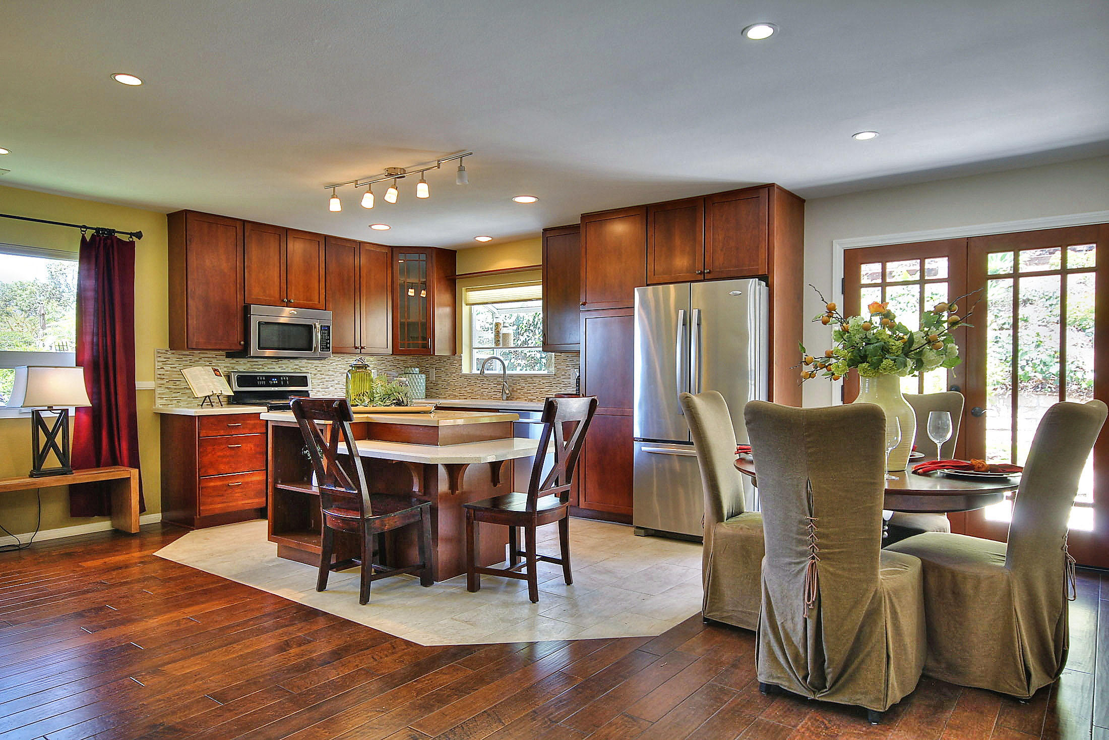 a view of a dining room with furniture window and wooden floor