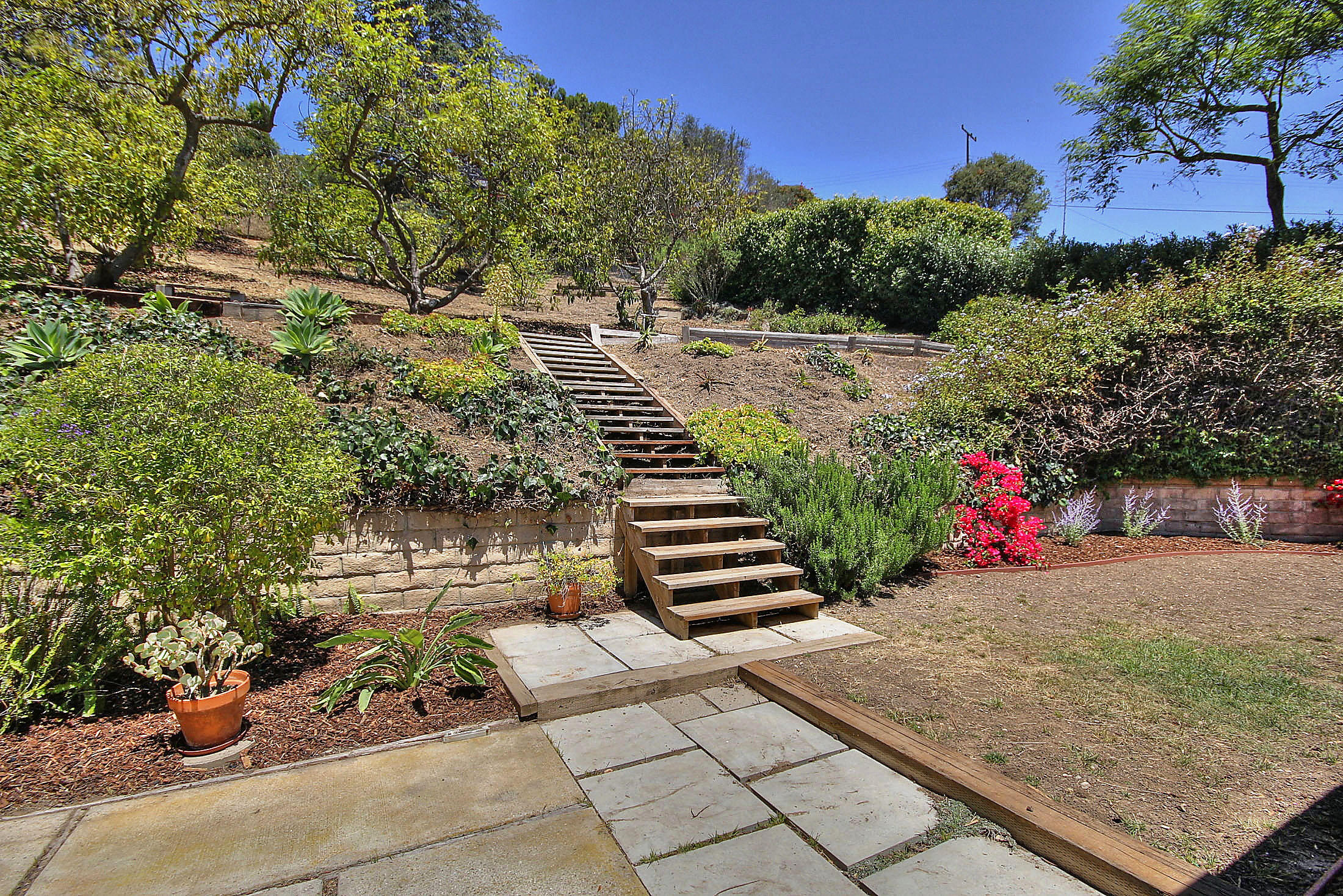 515 Fellowship Road Santa Barbara, CA 93109 - Photo 20 of 25 a view of a yard with an outdoor space