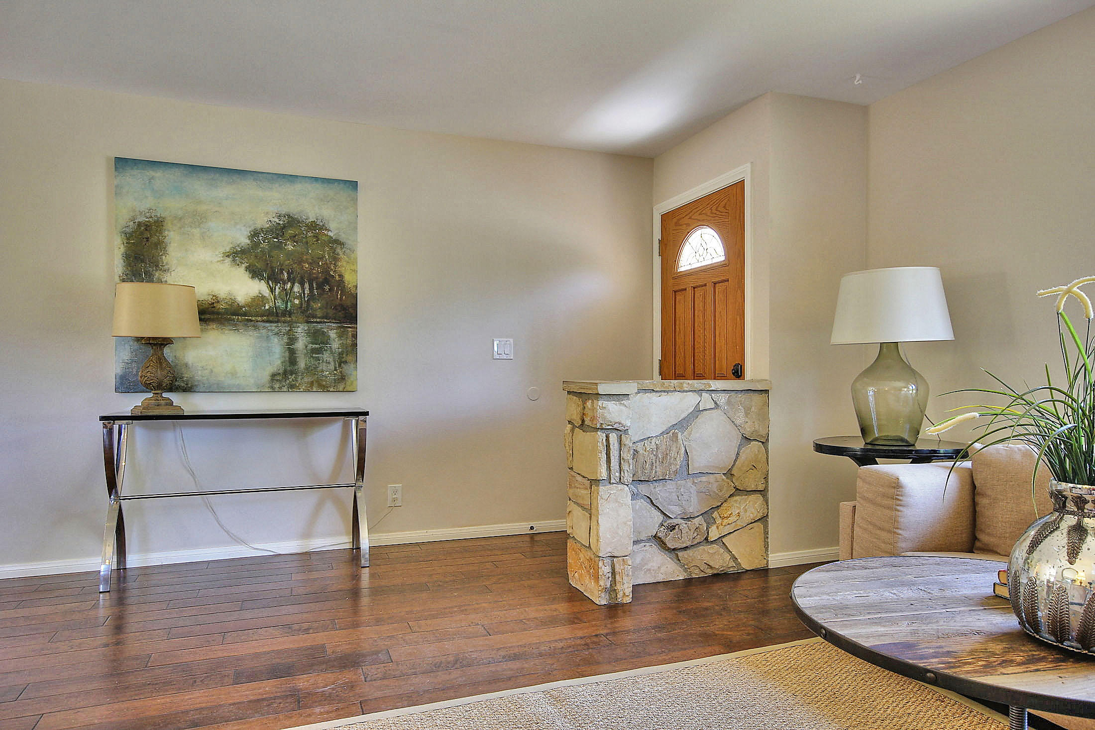 515 Fellowship Road Santa Barbara, CA 93109 - Photo 4 of 25 a workspace with furniture and wooden floor