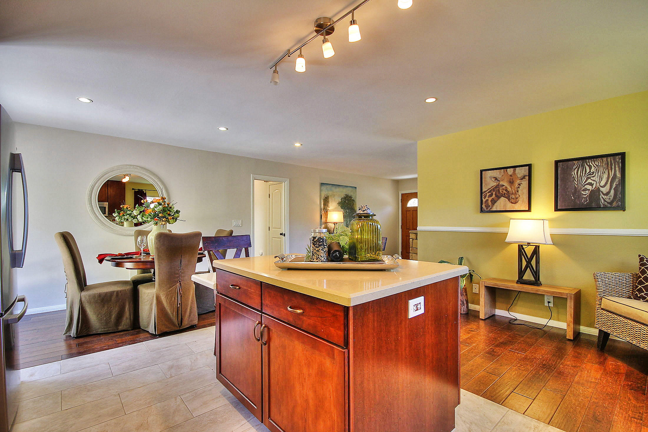 515 Fellowship Road Santa Barbara, CA 93109 - Photo 10 of 25 a living room with stainless steel appliances furniture a rug and a kitchen view