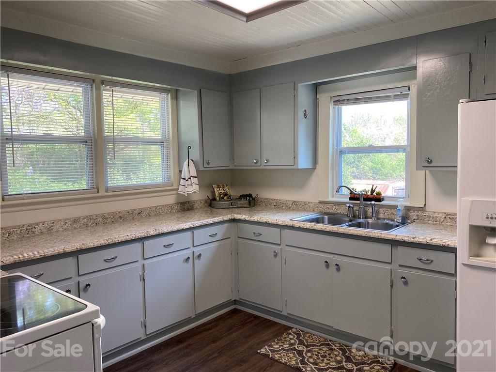 4123 Old Monroe Road Indian Trail, NC 28079 - Photo 8 of 14 a kitchen with a sink window and cabinets