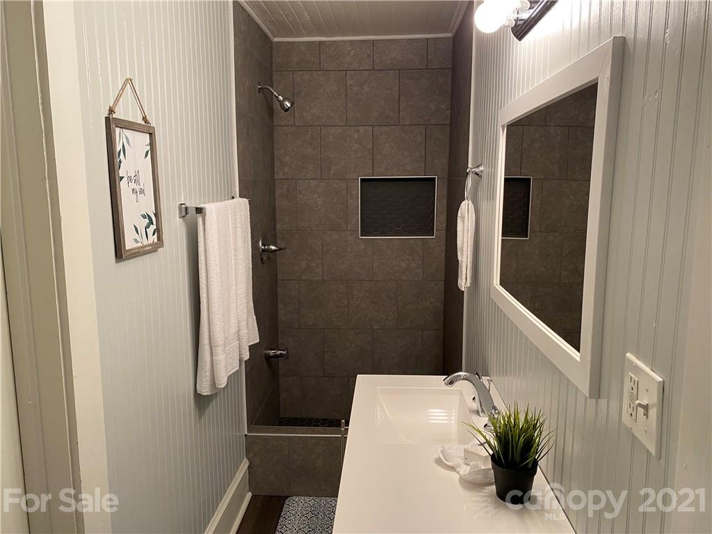 4123 Old Monroe Road Indian Trail, NC 28079 - Photo 10 of 14 a bathroom with a sink and shower