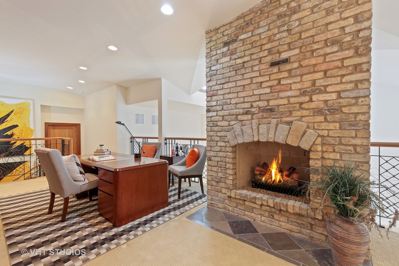 697 Rienzi Lane Highwood, IL 60040 - Photo 11 of 24 a living room with furniture and a fireplace