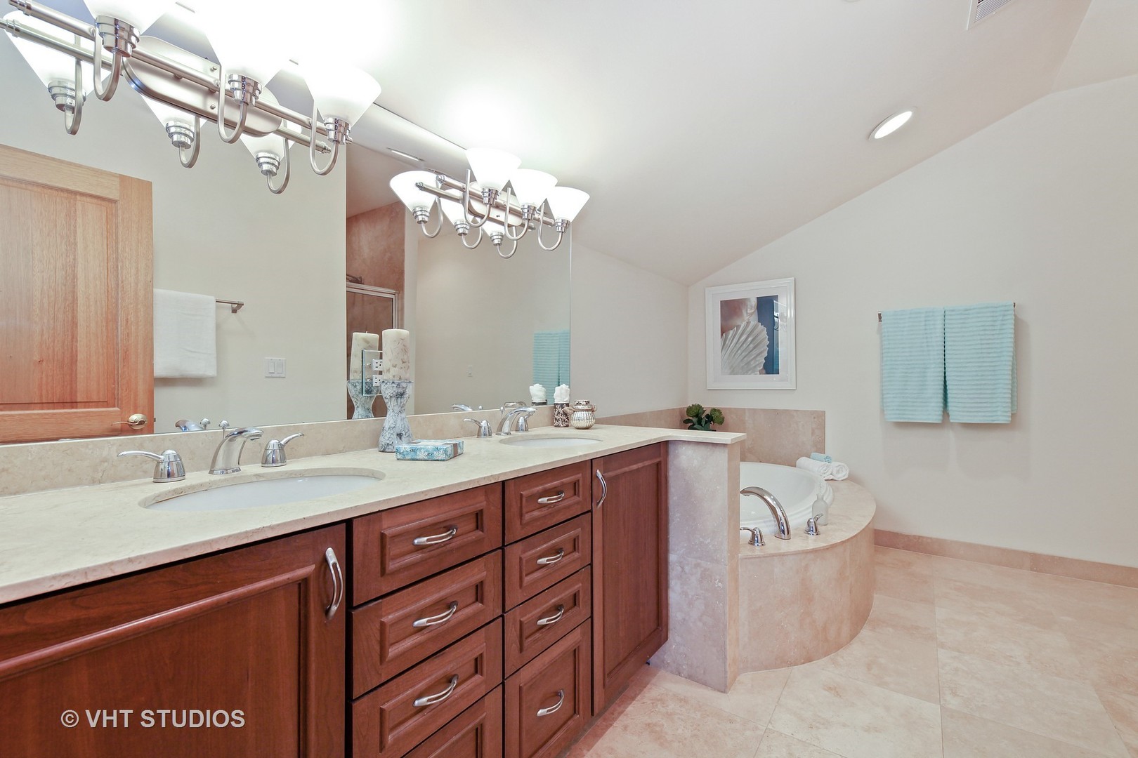 697 Rienzi Lane Highwood, IL 60040 - Photo 14 of 24 a spacious bathroom with a granite countertop double vanity sink a mirror and a bathtub