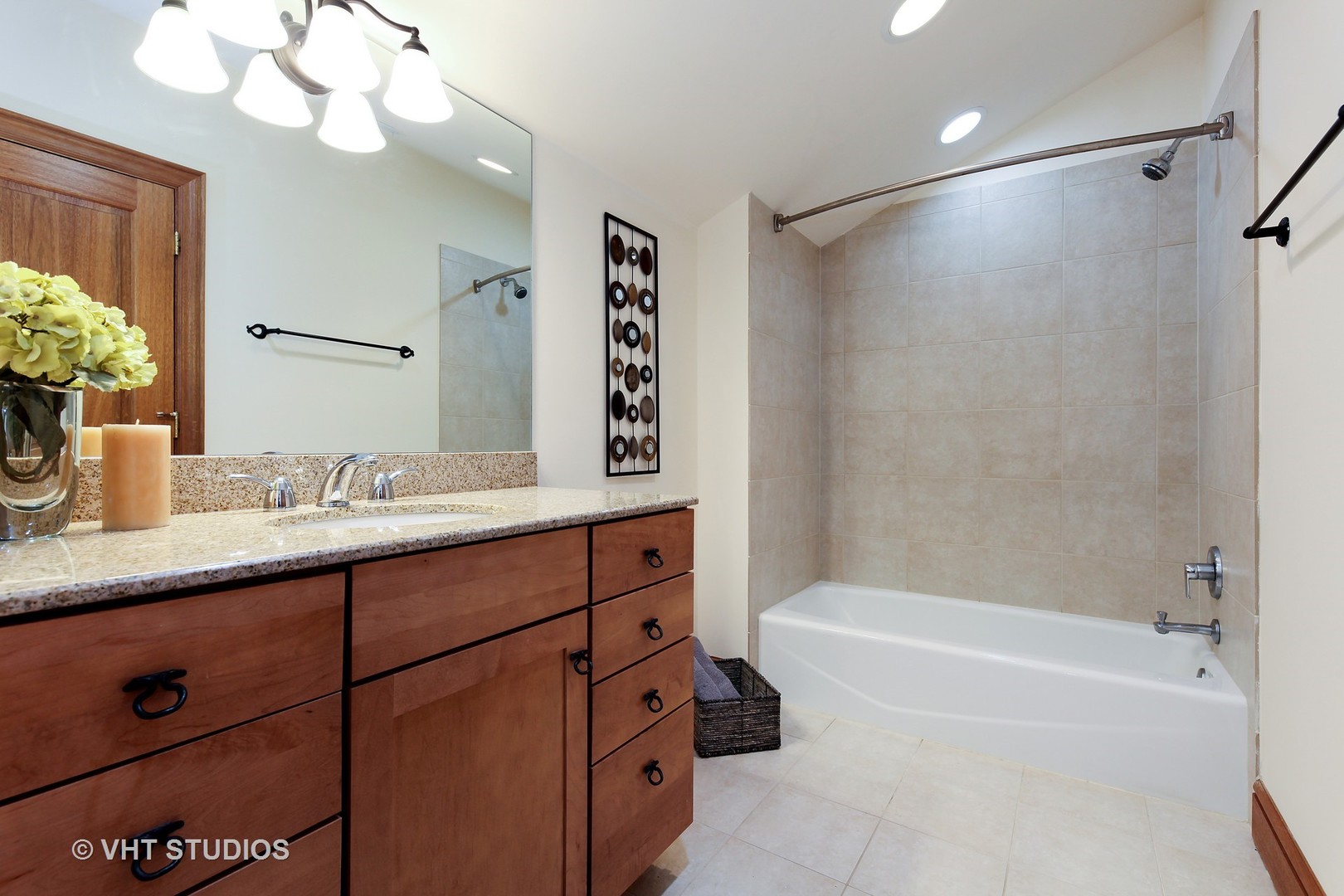 697 Rienzi Lane Highwood, IL 60040 - Photo 18 of 24 a bathroom with a granite countertop sink a toilet and bathtub