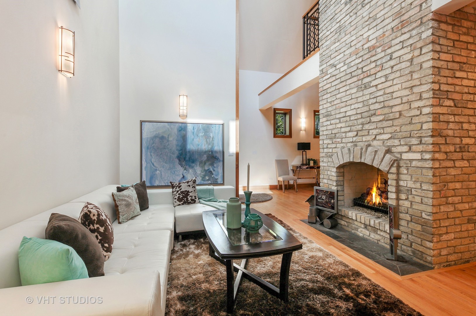 697 Rienzi Lane Highwood, IL 60040 - Photo 4 of 24 a living room with furniture and a fireplace