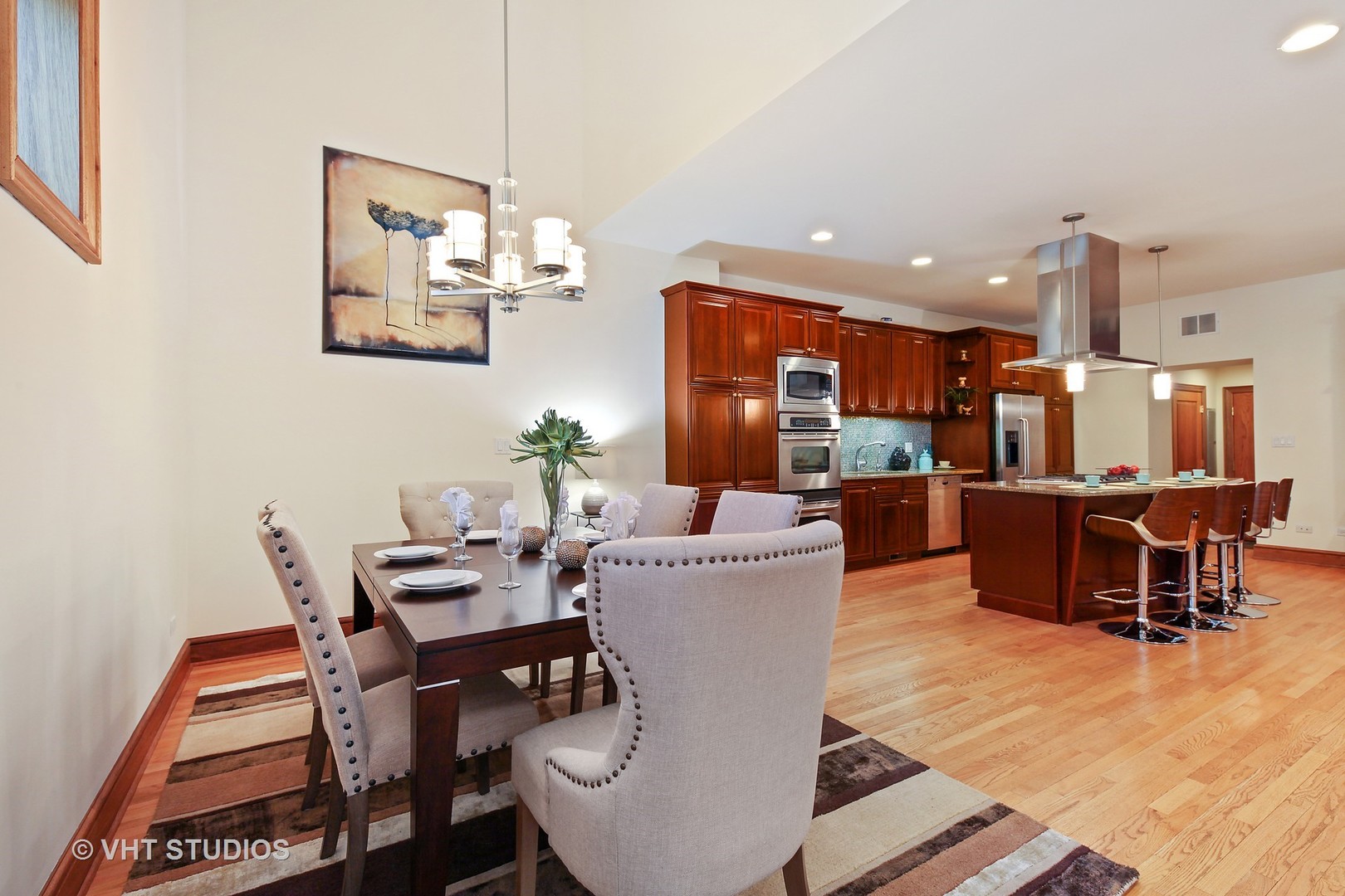 697 Rienzi Lane Highwood, IL 60040 - Photo 6 of 24 a dining room with furniture and wooden floor