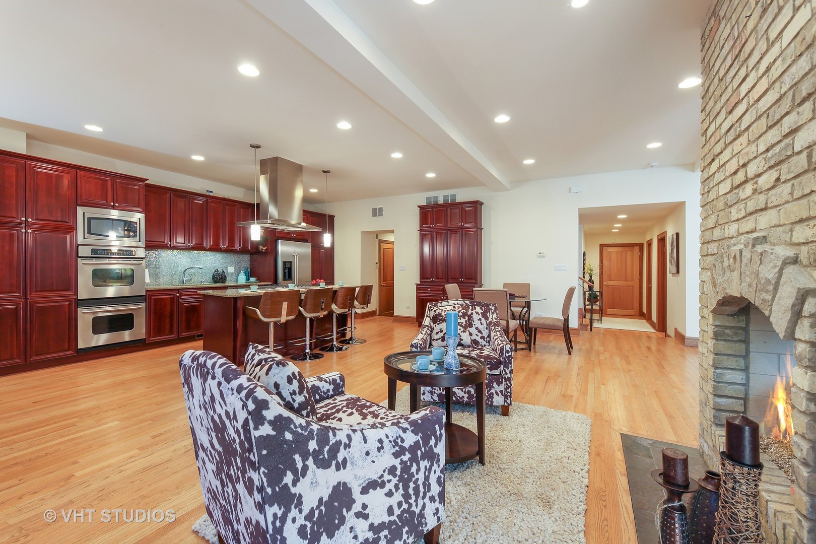 697 Rienzi Lane Highwood, IL 60040 - Photo 7 of 24 a living room with furniture and a wooden floor