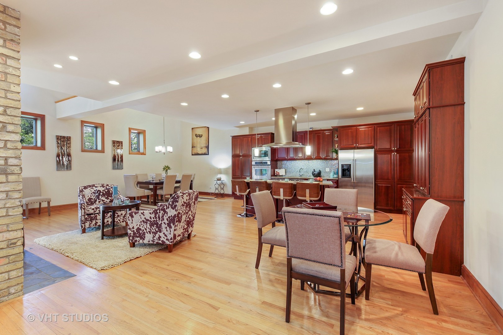 697 Rienzi Lane Highwood, IL 60040 - Photo 8 of 24 a living room with lots of furniture and kitchen view