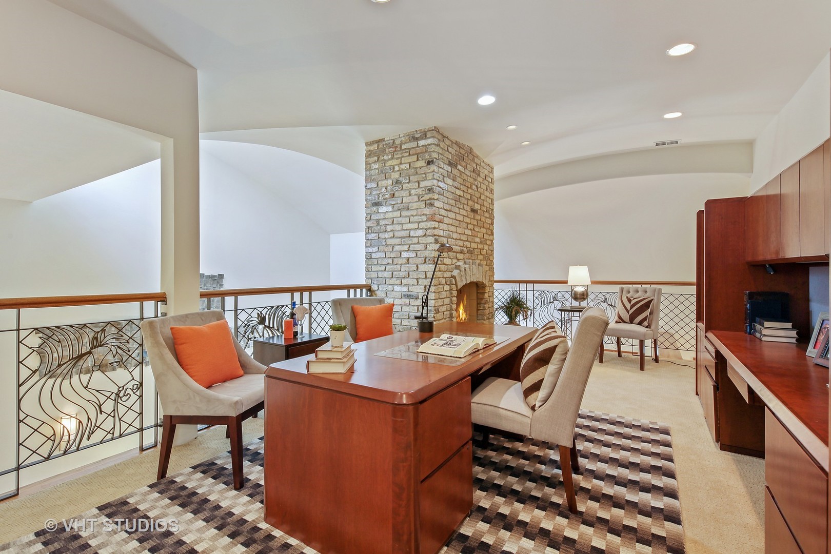 697 Rienzi Lane Highwood, IL 60040 - Photo 10 of 24 a living room with furniture a rug and a fireplace
