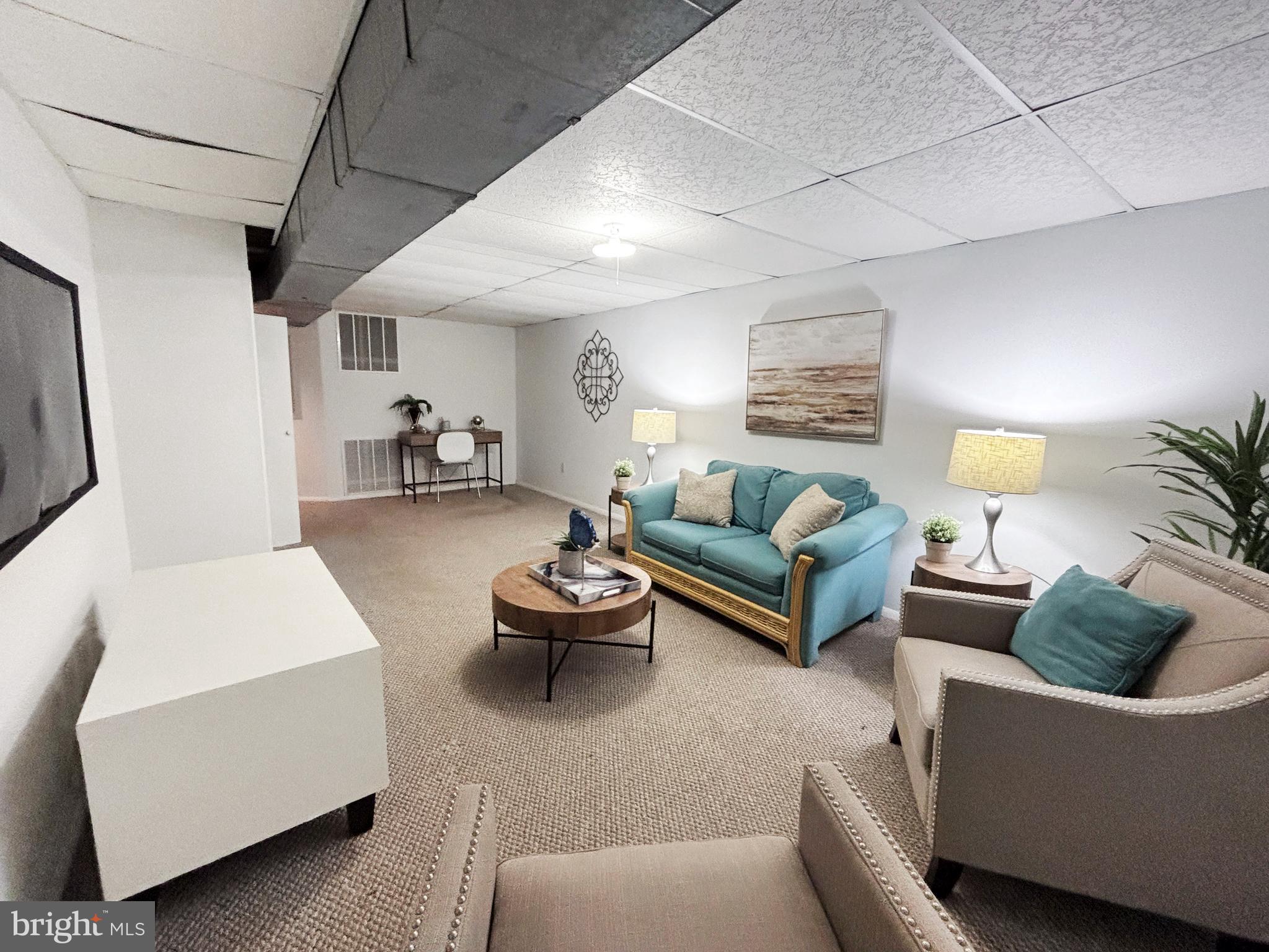 8 Beckett Court Ewing, NJ 08628 - Photo 11 of 20 a living room with furniture and a wooden floor
