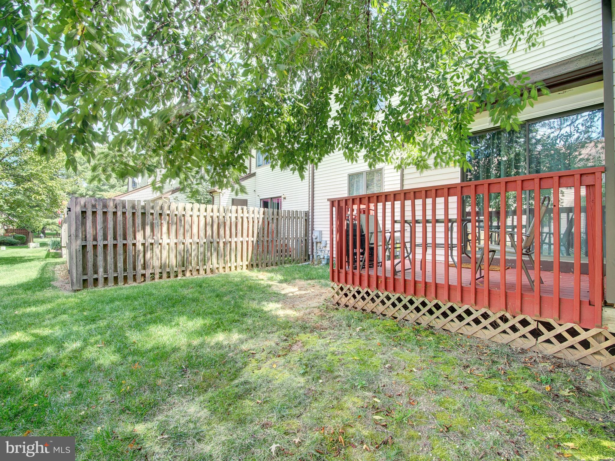 8 Beckett Court Ewing, NJ 08628 - Photo 18 of 20 a view of a backyard with a trees