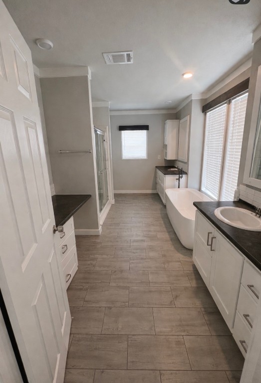 2854 Benny Griffin Road Livingston, TX 77351 - Photo 12 of 19 a large white kitchen with sink and refrigerator