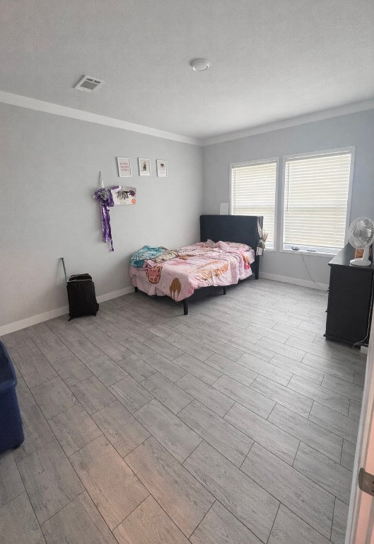 2854 Benny Griffin Road Livingston, TX 77351 - Photo 13 of 19 a bedroom with a bed and a couch