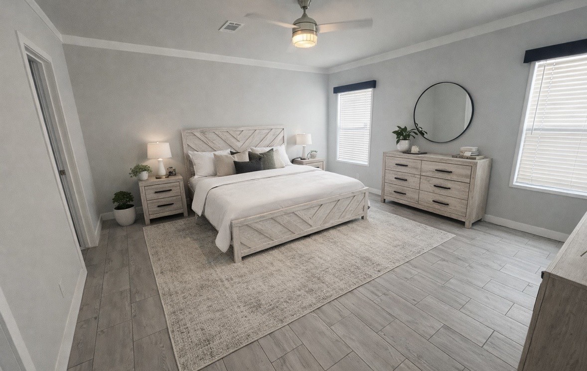 2854 Benny Griffin Road Livingston, TX 77351 - Photo 18 of 19 a bedroom with a bed a mirror on dresser and a window
