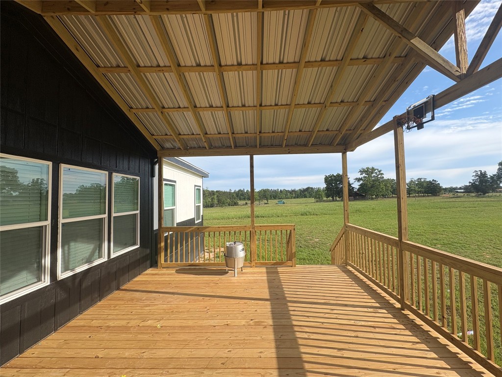 2854 Benny Griffin Road Livingston, TX 77351 - Photo 5 of 19 a view of a swimming pool with a patio