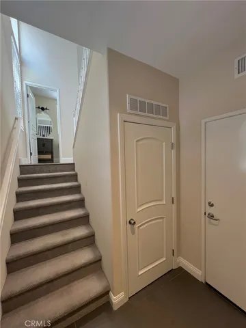 a view of an entryway with staircase