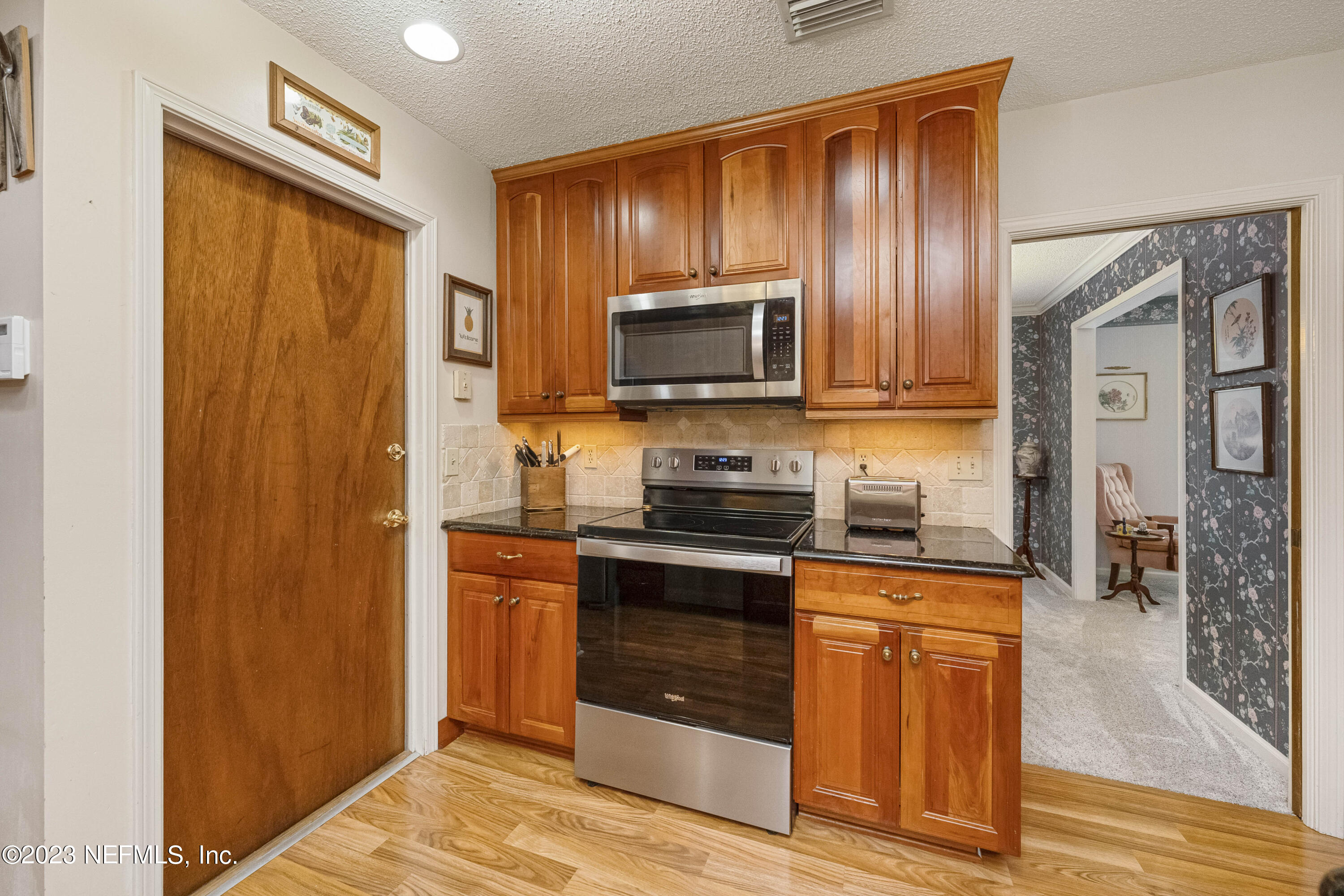 8431 Newton Road Jacksonville, FL 32216 - Photo 13 of 33 Kitchen to Dining Room