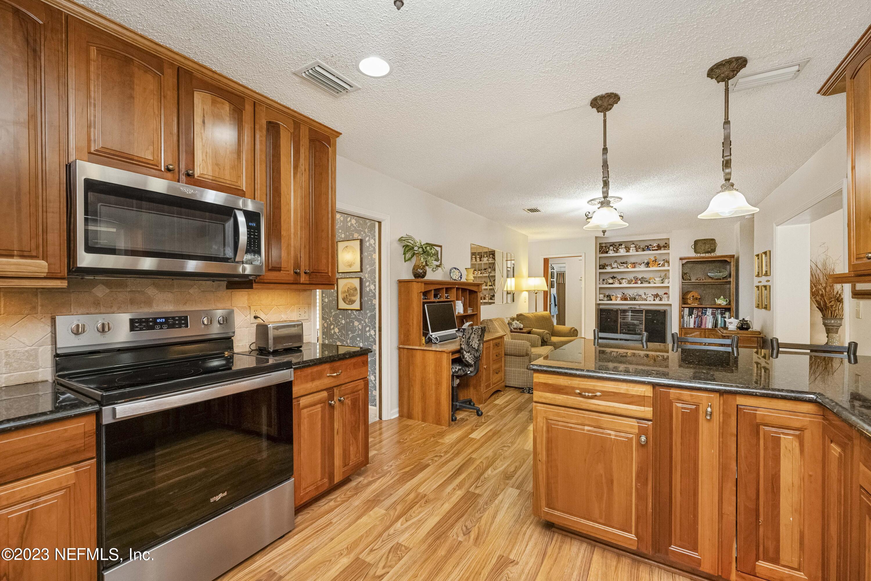 8431 Newton Road Jacksonville, FL 32216 - Photo 14 of 33 Kitchen to Sitting Room
