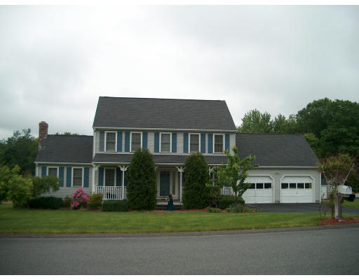 20 Cedar Hill Road Sutton, MA 01590 - Photo 1 of 1 a front view of a house with a garden