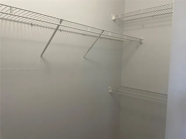 a view of a room with racks on the wall