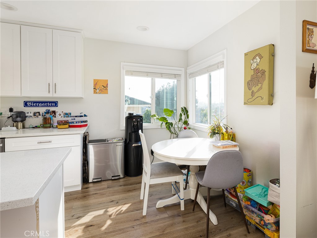 526 Sheldon Street El Segundo, CA 90245 - Photo 12 of 41 a view of a dining room with furniture and wooden floor