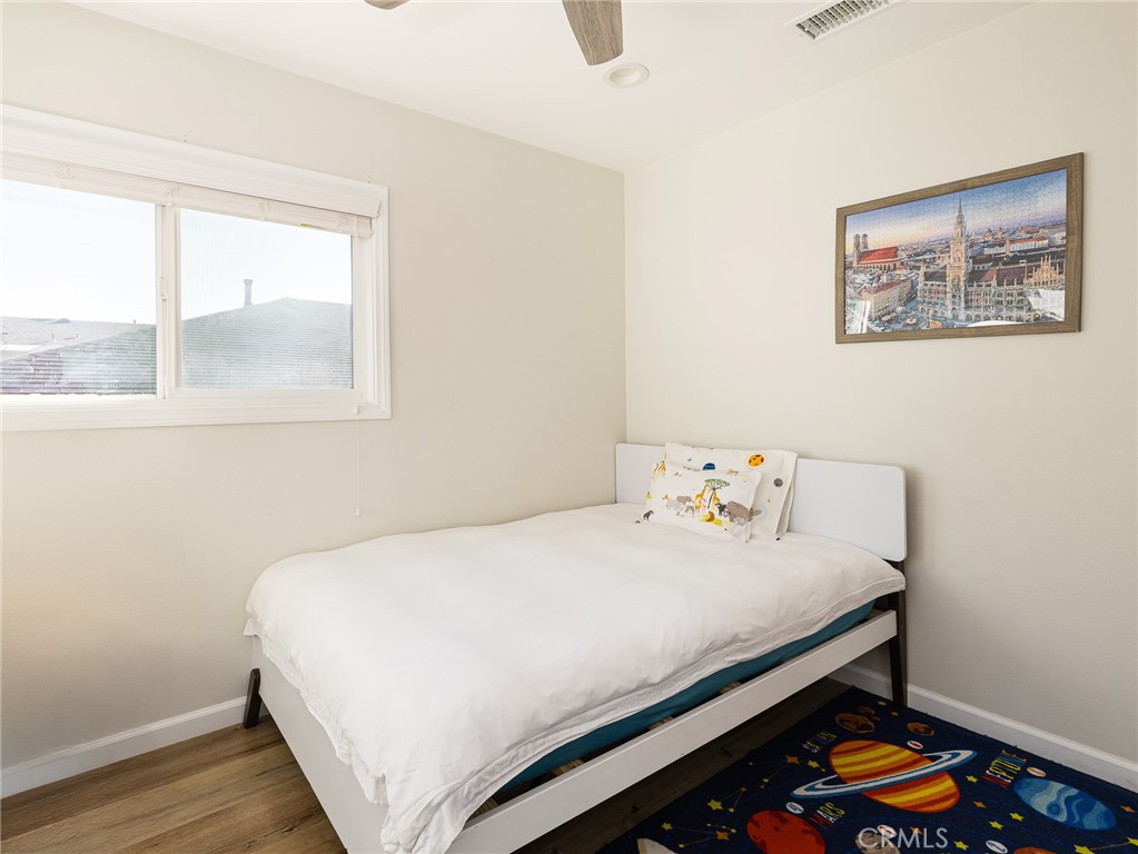 526 Sheldon Street El Segundo, CA 90245 - Photo 19 of 41 a bedroom with a bed and a window