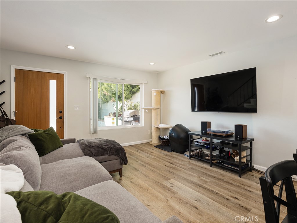 526 Sheldon Street El Segundo, CA 90245 - Photo 23 of 41 a living room with furniture and a flat screen tv