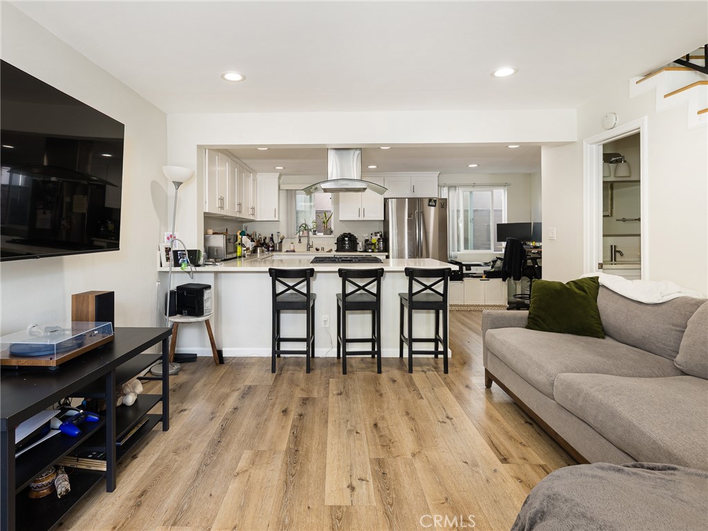 526 Sheldon Street El Segundo, CA 90245 - Photo 24 of 41 a living room with furniture and a flat screen tv