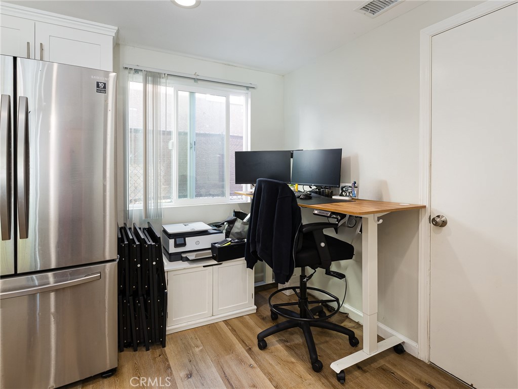 526 Sheldon Street El Segundo, CA 90245 - Photo 28 of 41 a view of a workspace with furniture and a window