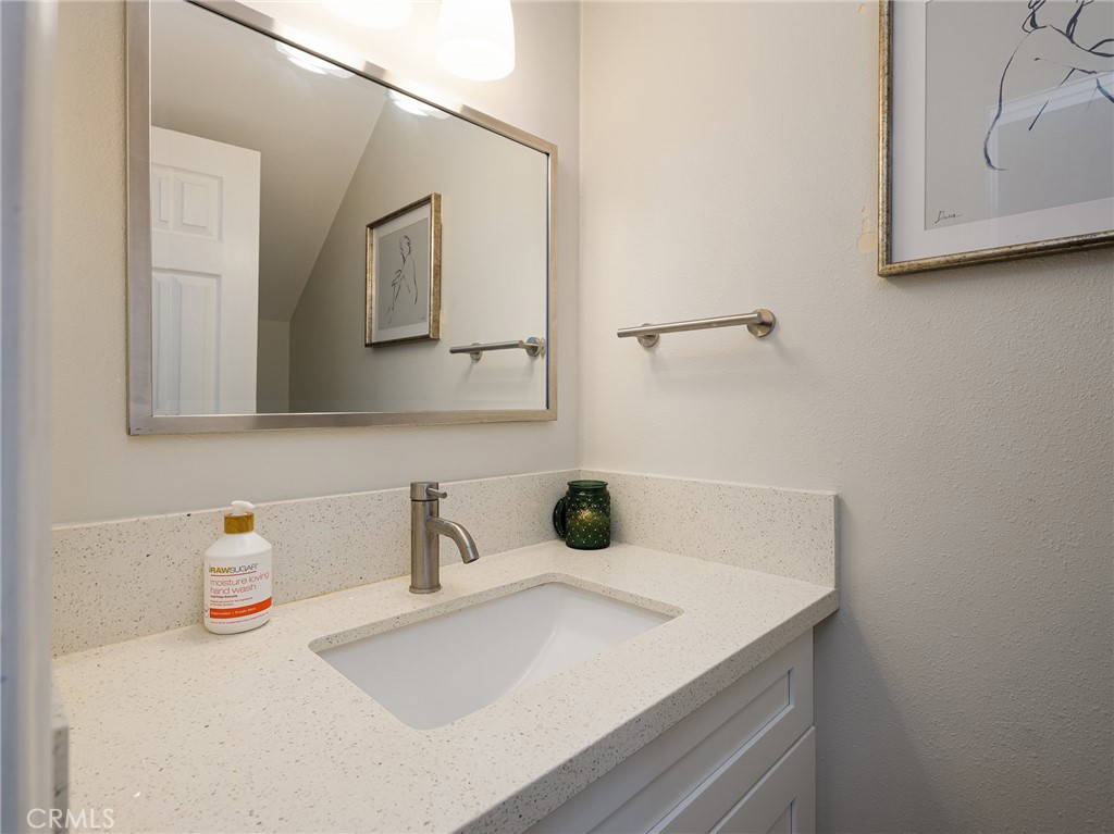 526 Sheldon Street El Segundo, CA 90245 - Photo 29 of 41 a bathroom with a sink and a mirror