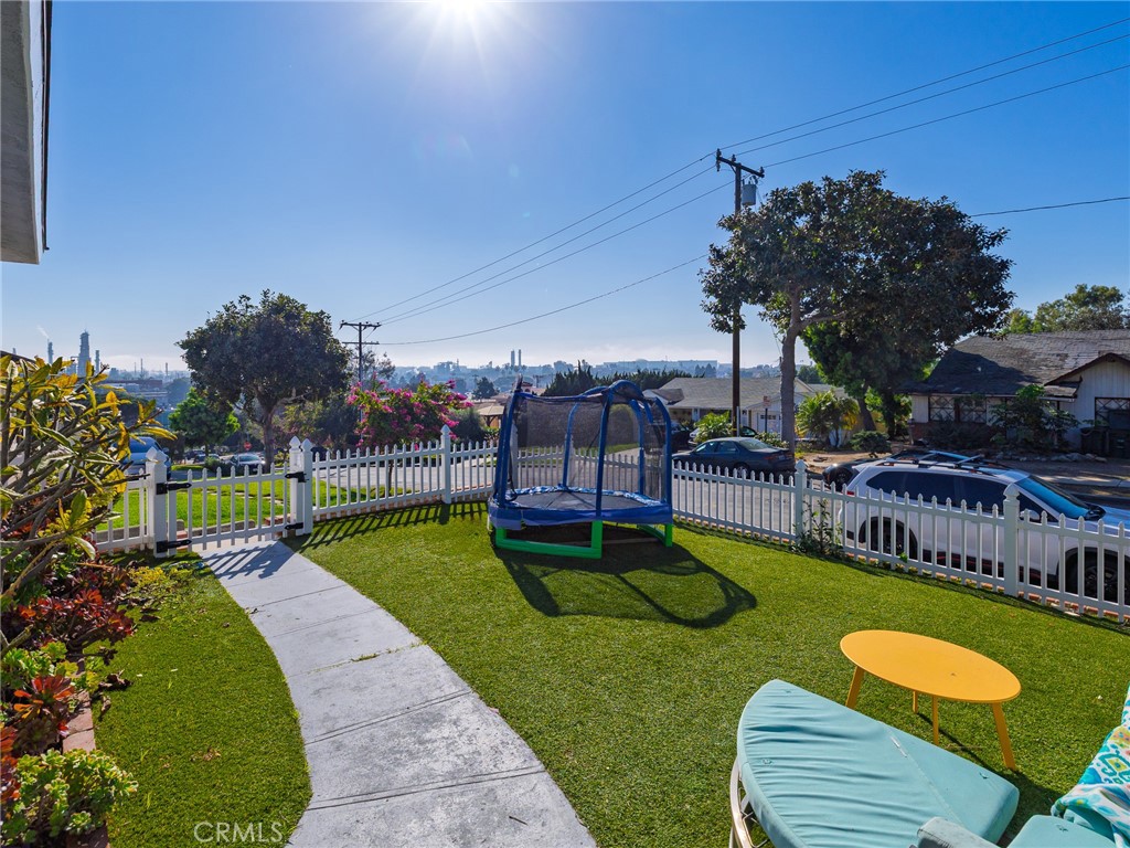 526 Sheldon Street El Segundo, CA 90245 - Photo 4 of 41 a view of a swimming pool with a patio and a yard