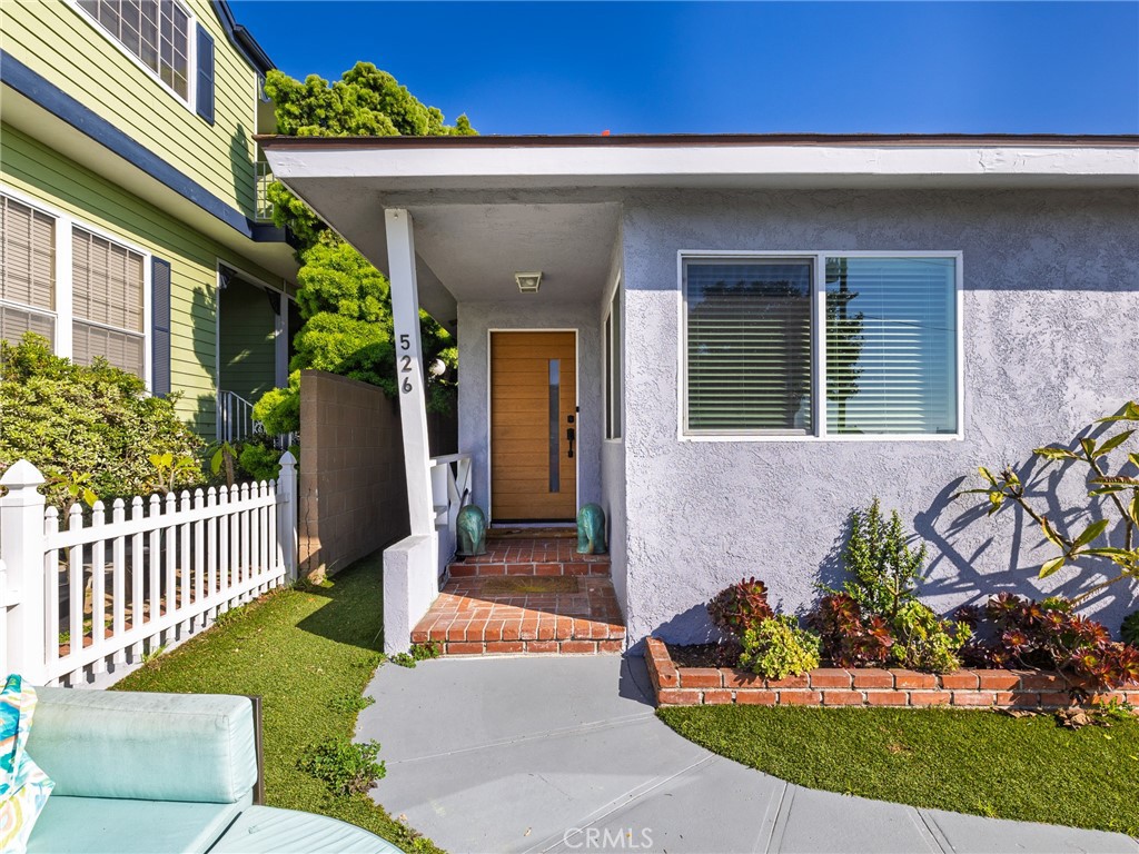 526 Sheldon Street El Segundo, CA 90245 - Photo 5 of 41 a front view of a house with a porch