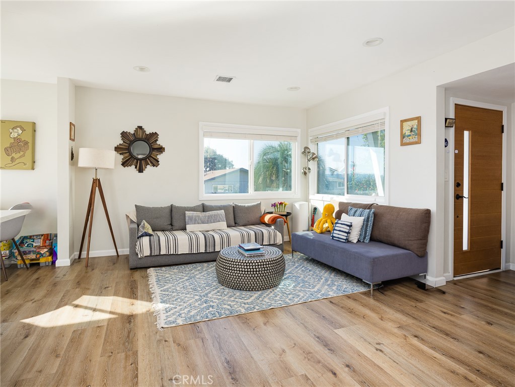 526 Sheldon Street El Segundo, CA 90245 - Photo 7 of 41 a living room with furniture and a large window