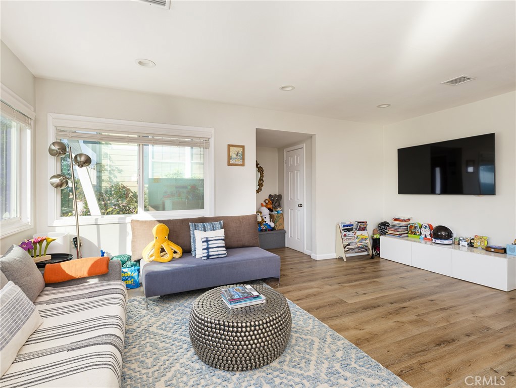 526 Sheldon Street El Segundo, CA 90245 - Photo 8 of 41 a living room with furniture and a flat screen tv