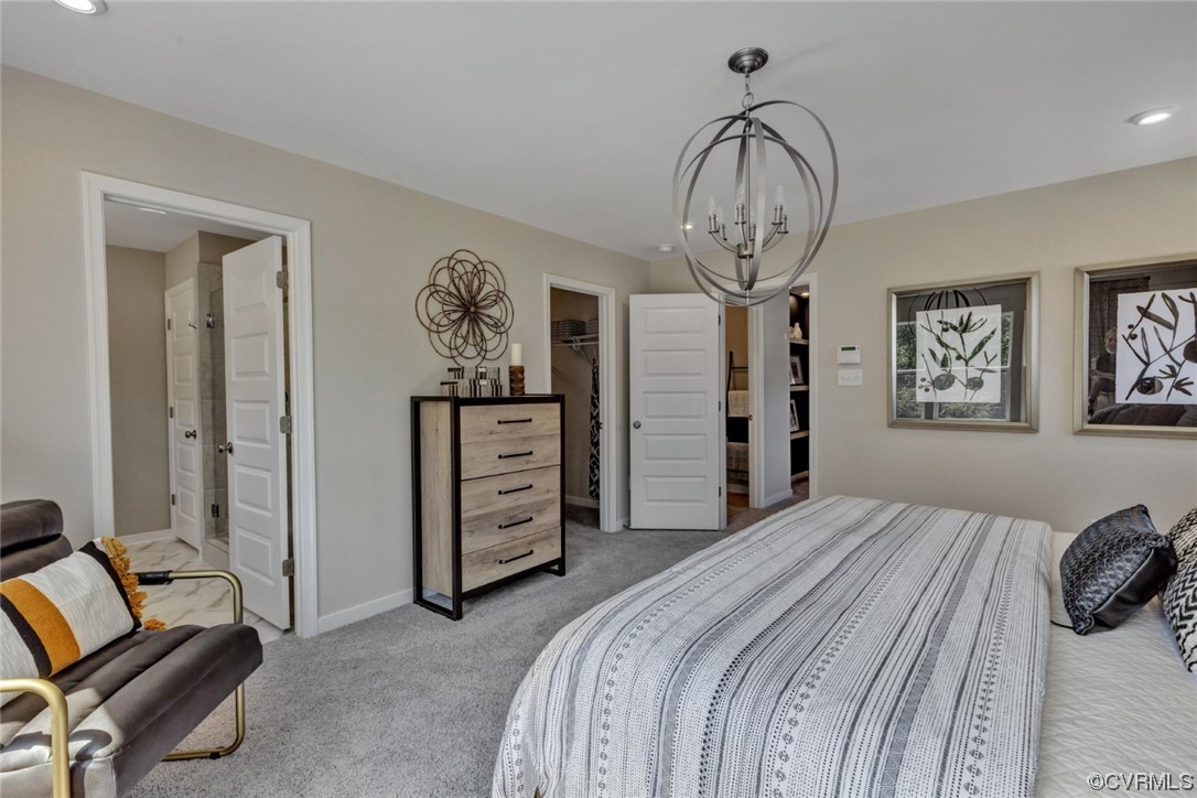 12836 Deep Wl Road Midlothian, VA 23112 - Photo 17 of 48 a bedroom with a bed and a chandelier