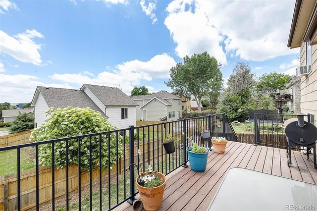 a view of a two chairs in the roof deck