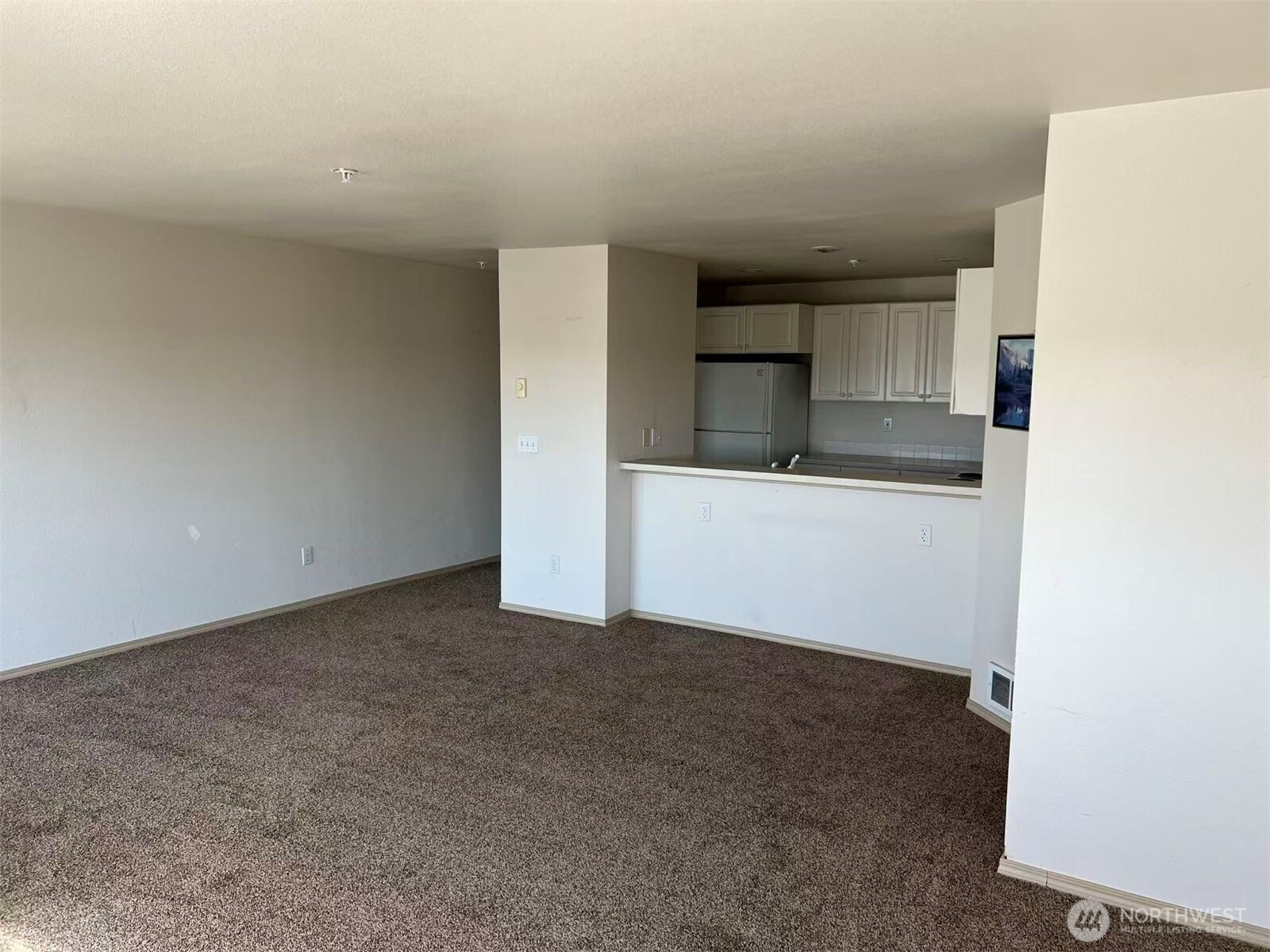 1160 Monroe Avenue Northeast, Unit D3 Renton, WA 98056 - Photo 6 of 15 a view of a kitchen with a sink and an oven