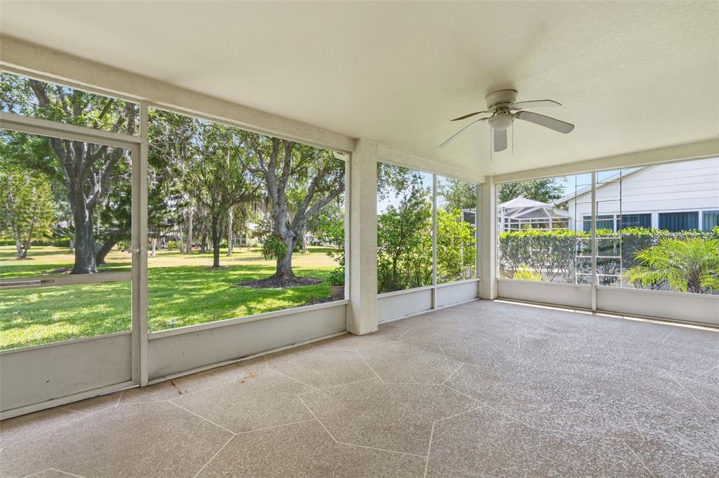 1444 Canberley Court Trinity, FL 34655 - Photo 31 of 52 a view of a room with porch and wooden floor