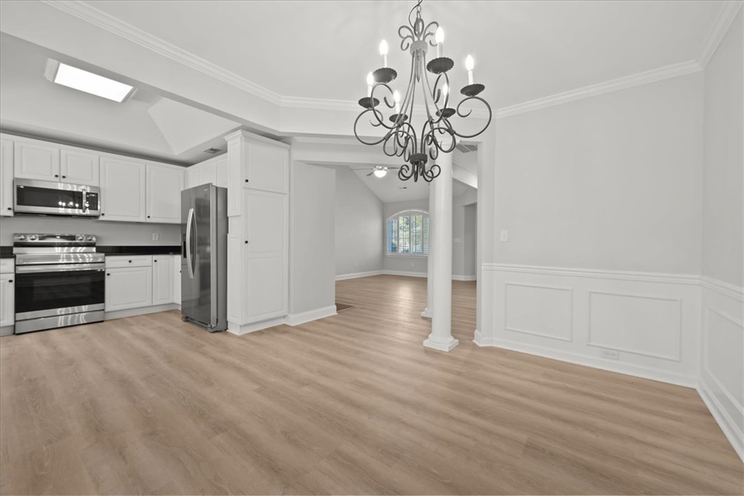 100 Shipyard Circle Anderson, SC 29621 - Photo 10 of 40 This spacious kitchen and dining area features contemporary finishes and an open-concept layout.